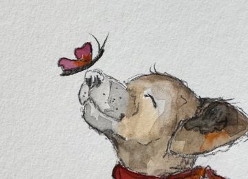 Eine Postkarte mit einem Hundenmotiv und dem Spruch Für die kleinen Glücksmomente